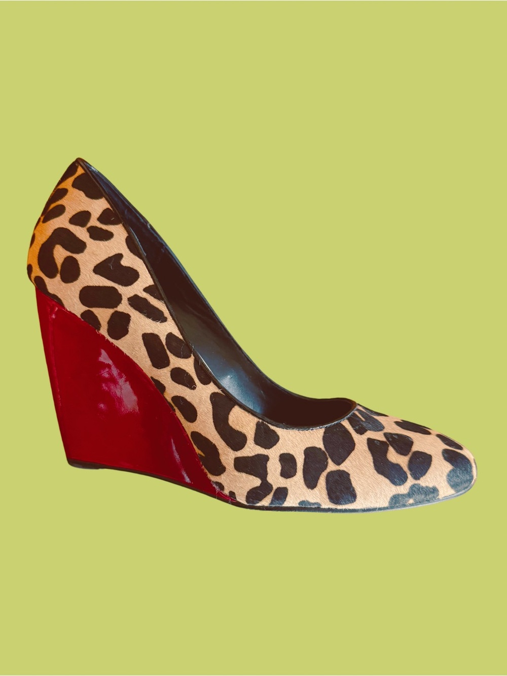 Leopard Print Calf Hair Wedge Pump with Red Heel